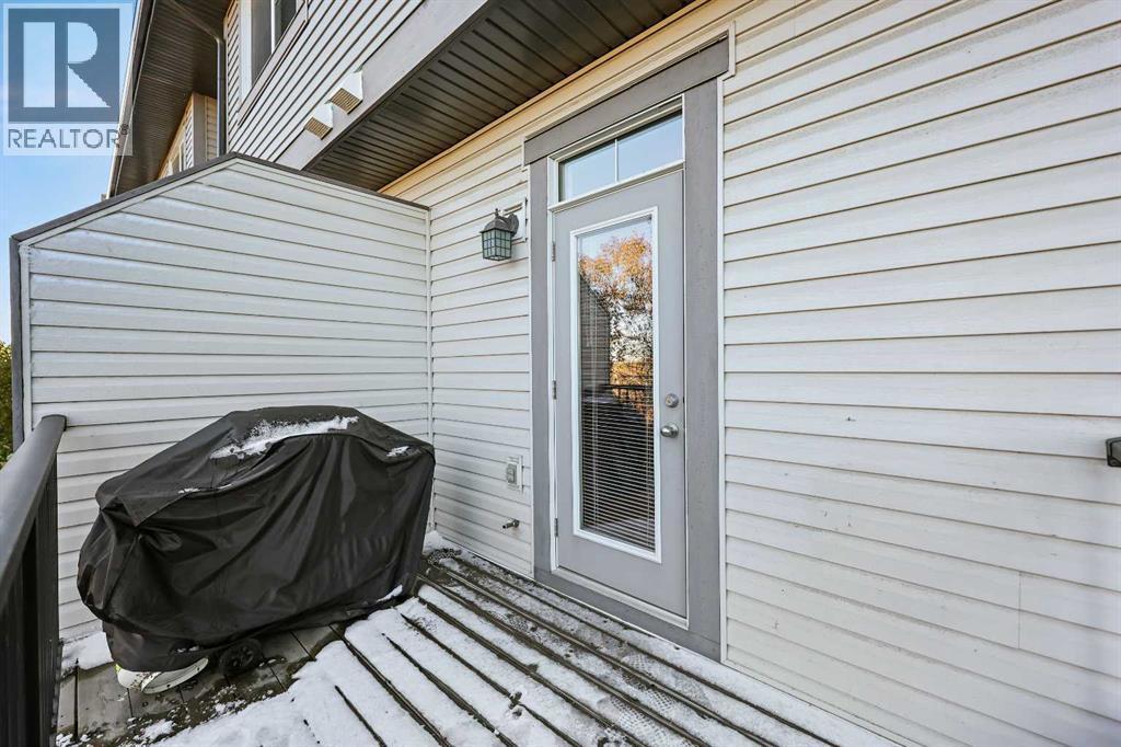 68 New Brighton Point Se, Calgary, AB - Outdoor With Deck Patio Veranda With Exterior