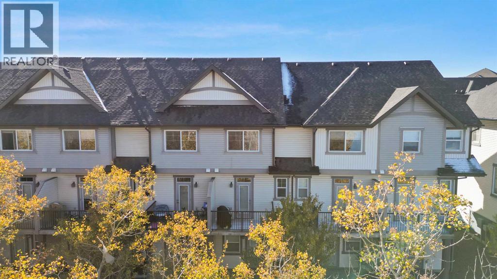 68 New Brighton Point Se, Calgary, AB - Outdoor With Facade