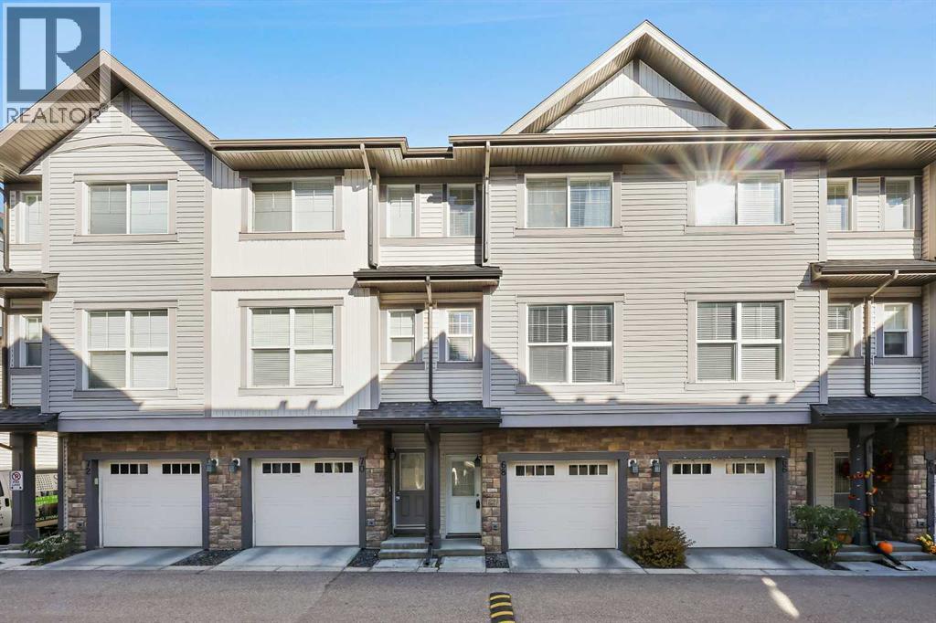 68 New Brighton Point Se, Calgary, AB - Outdoor With Facade