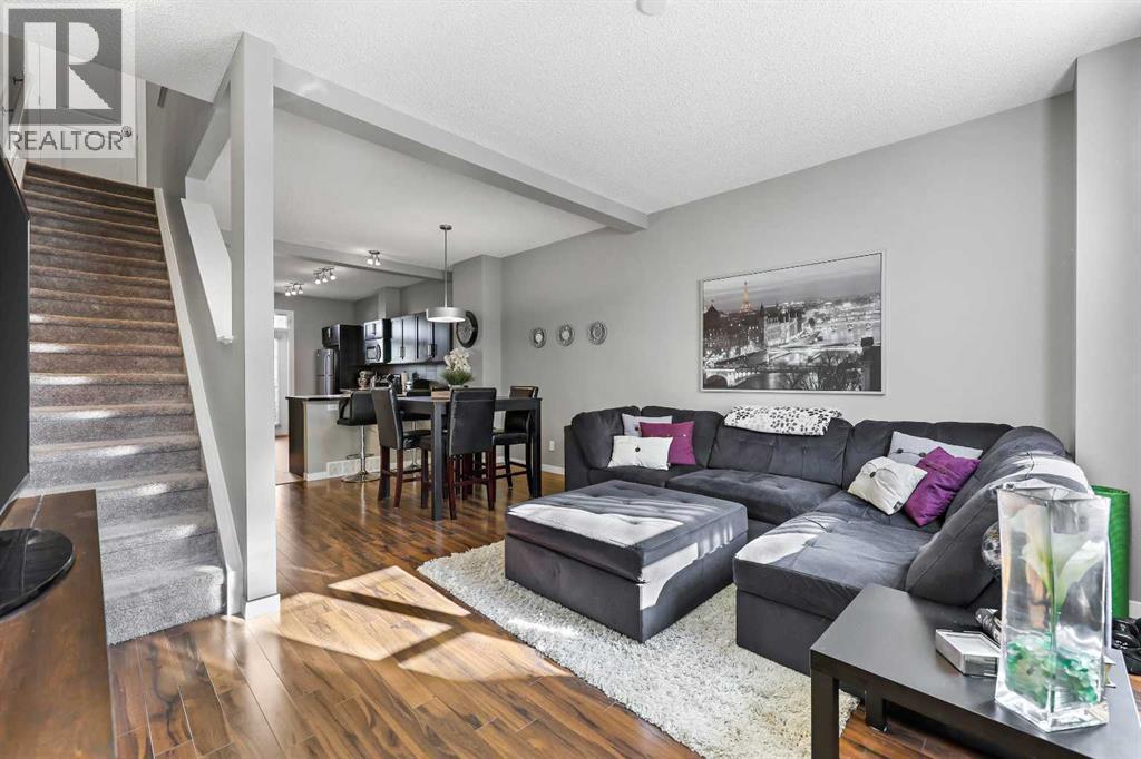 68 New Brighton Point Se, Calgary, AB - Indoor Photo Showing Living Room