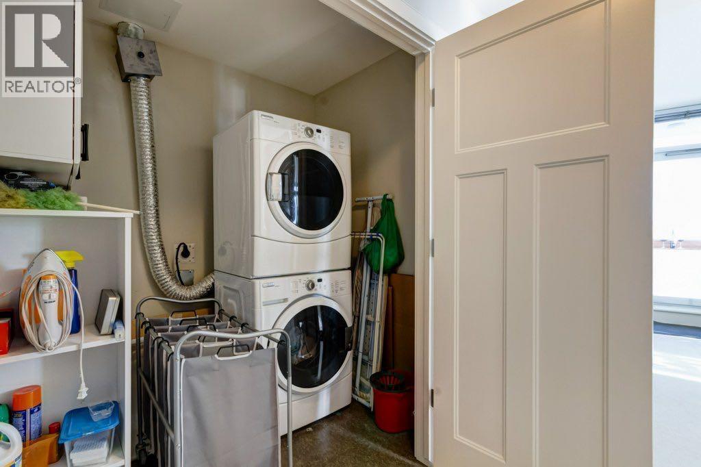 Upper level laundry - 602, 99 Spruce Place Sw, Calgary, AB - Indoor Photo Showing Laundry Room