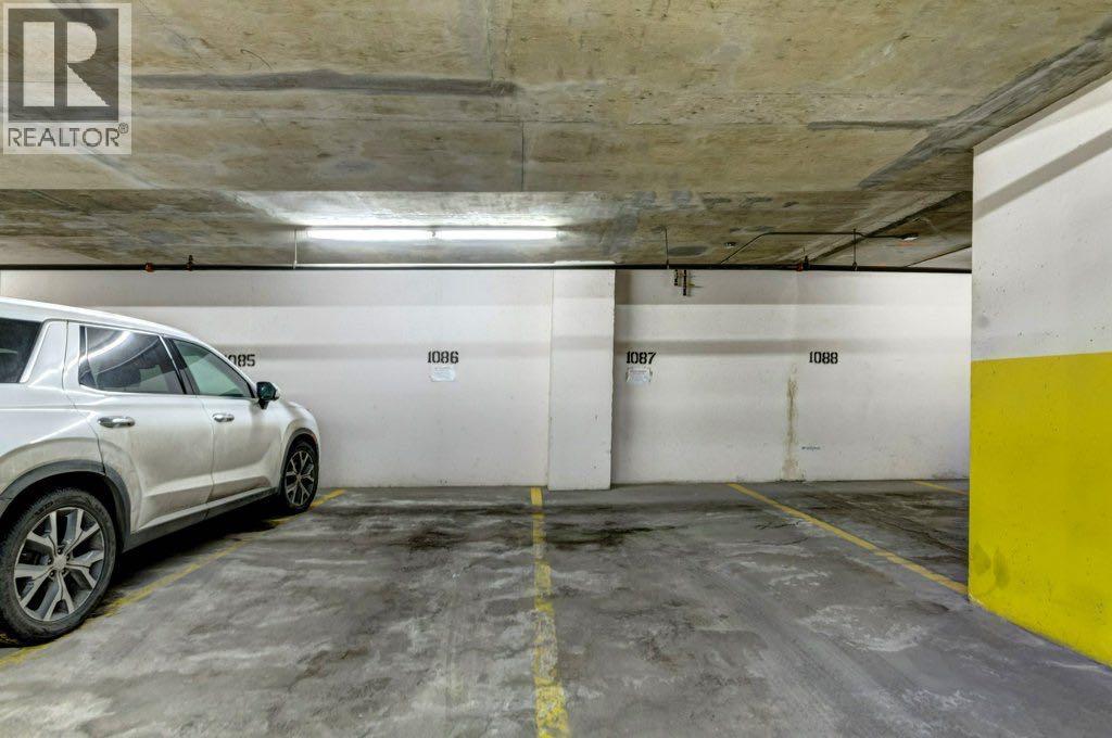 2 titled parking stalls! - 602, 99 Spruce Place Sw, Calgary, AB - Indoor Photo Showing Garage