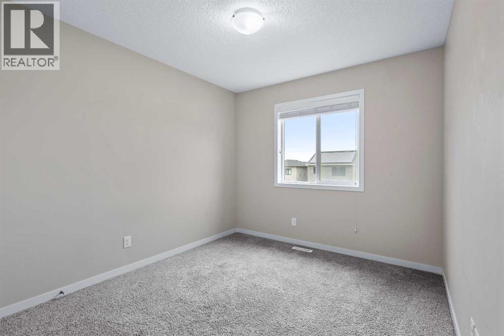 44 Howse Drive Ne, Calgary, AB - Indoor Photo Showing Other Room