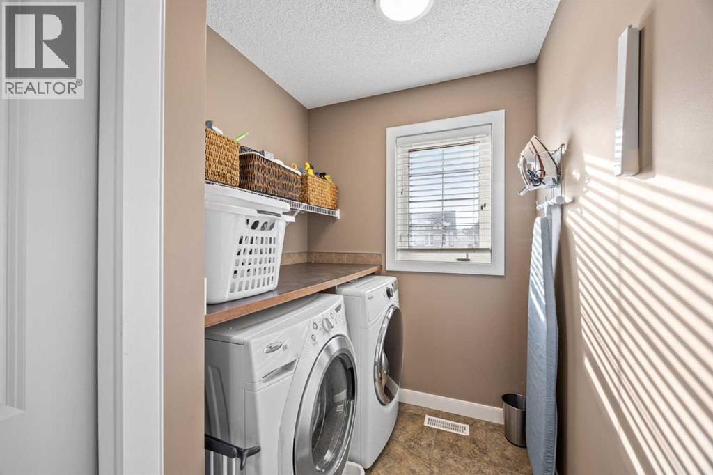 202 Royal Oak Heath Nw, Calgary, AB - Indoor Photo Showing Laundry Room