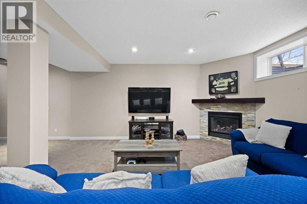 202 Royal Oak Heath Nw, Calgary, AB - Indoor With Fireplace