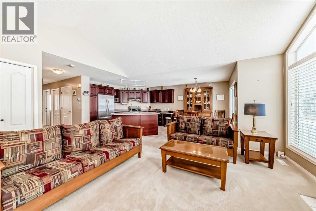 417 Hope Bay, Rural Rocky View County, AB - Indoor Photo Showing Living Room
