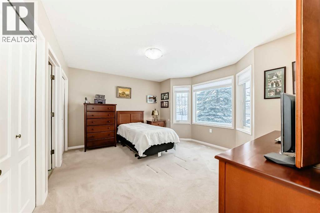 Nice Bay Window - 417 Hope Bay, Rural Rocky View County, AB - Indoor Photo Showing Bedroom