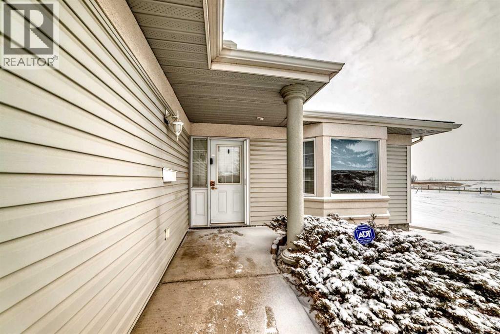 Come on in! - 417 Hope Bay, Rural Rocky View County, AB - Outdoor With Exterior
