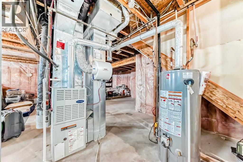 417 Hope Bay, Rural Rocky View County, AB - Indoor Photo Showing Basement
