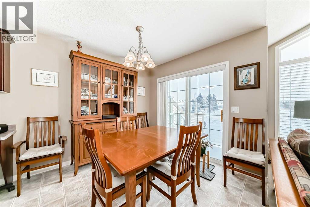 Ample dining space - 417 Hope Bay, Rural Rocky View County, AB - Indoor Photo Showing Dining Room