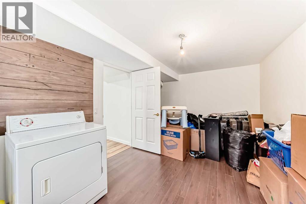 294 Elgin View Se, Calgary, AB - Indoor Photo Showing Laundry Room