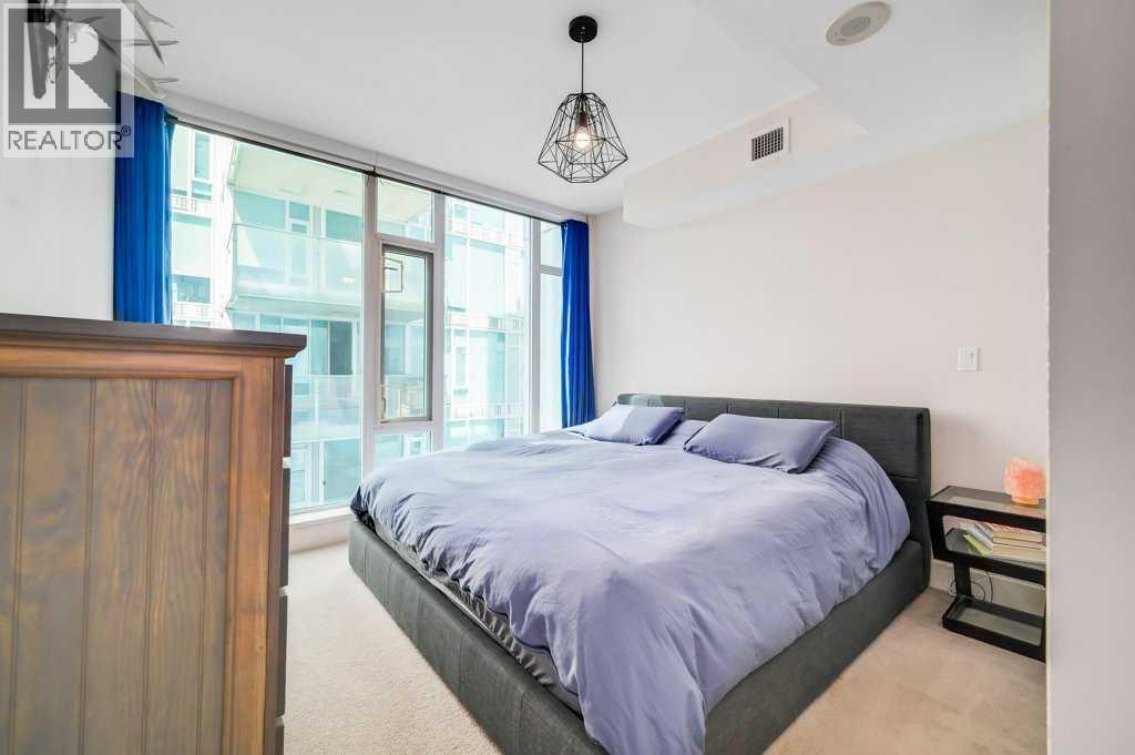 410, 560 6 Avenue Se, Calgary, AB - Indoor Photo Showing Bedroom