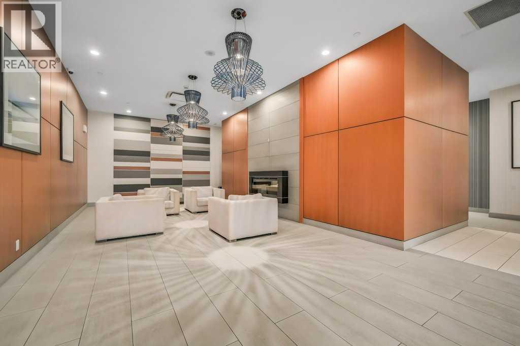 410, 560 6 Avenue Se, Calgary, AB - Indoor With Fireplace