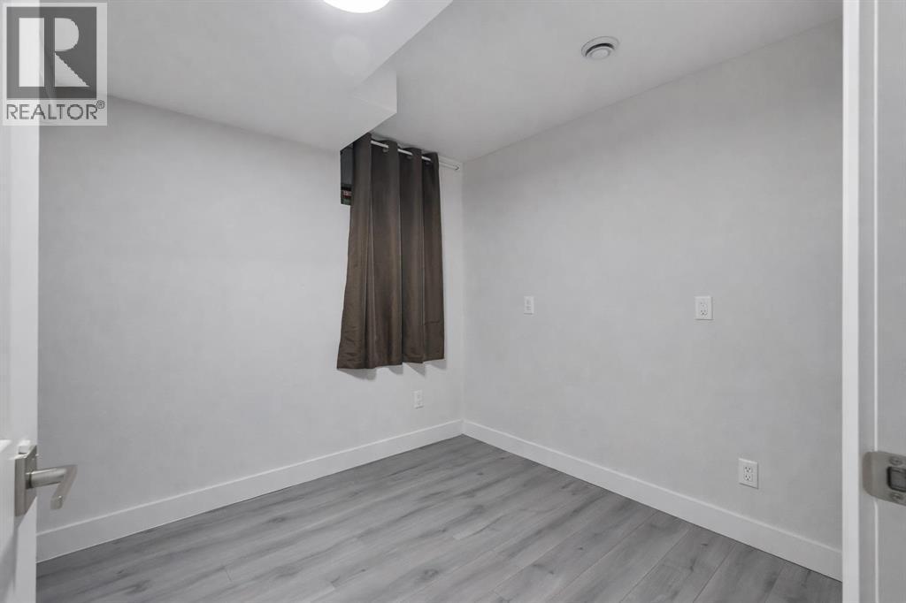 52 Saddlecreek Terrace Ne, Calgary, AB - Indoor Photo Showing Other Room