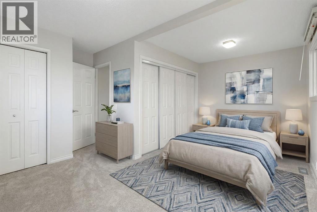 large primary bedroom - virtually staged - 987 Berkley Drive Nw, Calgary, AB - Indoor Photo Showing Bedroom