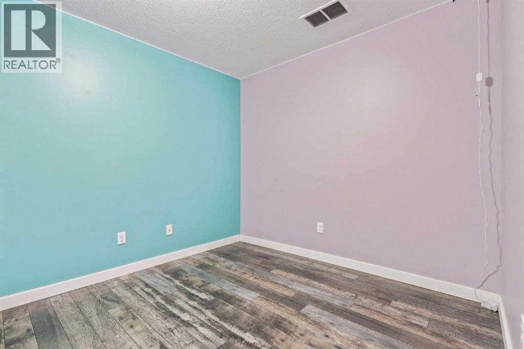 1005 Eagleview Place Nw, High River, AB - Indoor Photo Showing Other Room