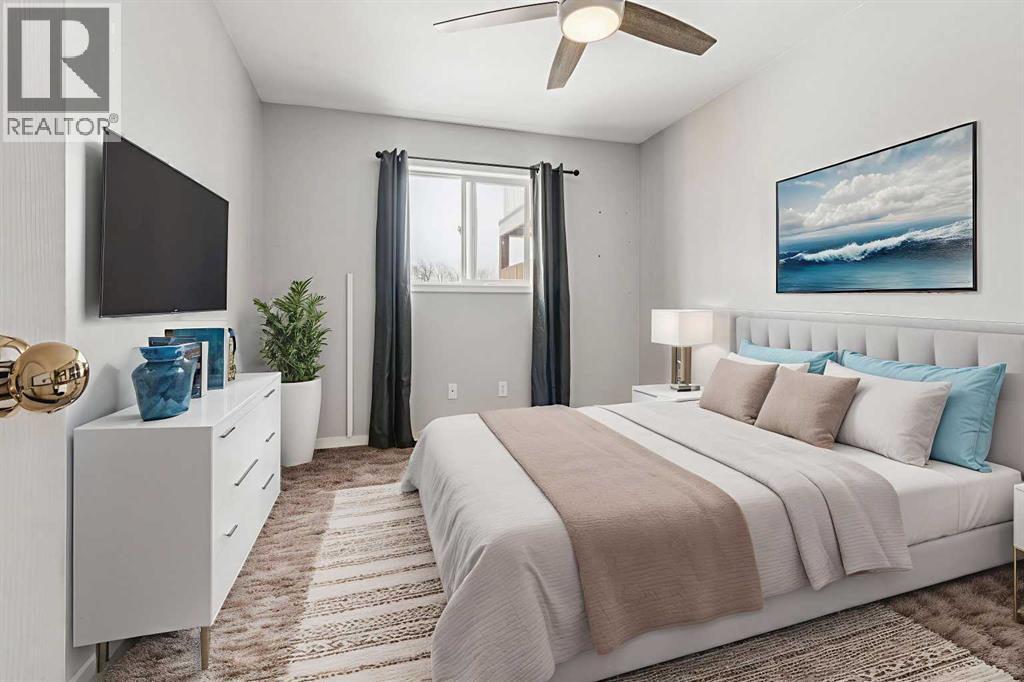 1005 Eagleview Place Nw, High River, AB - Indoor Photo Showing Bedroom