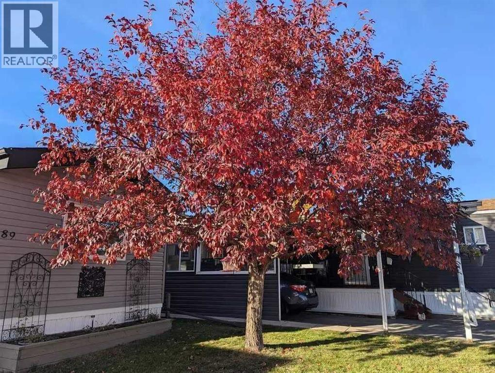 Front of home (summer) - 189, 99 Arbour Lake Road Nw, Calgary, AB