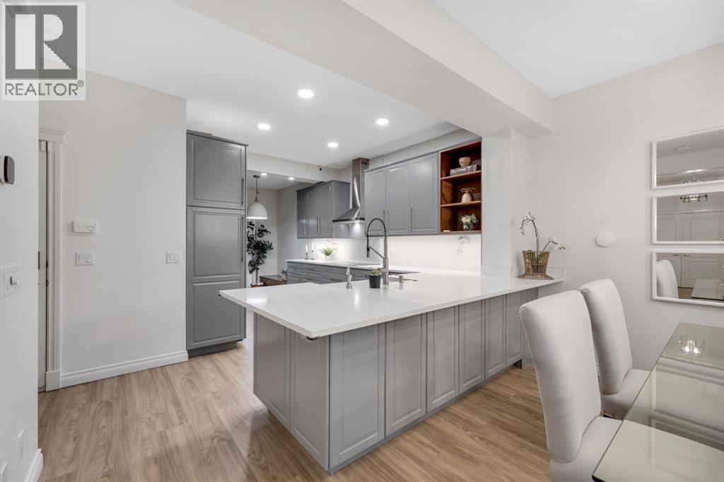 12, 10 St Julien Drive Sw, Calgary, AB - Indoor Photo Showing Kitchen With Upgraded Kitchen