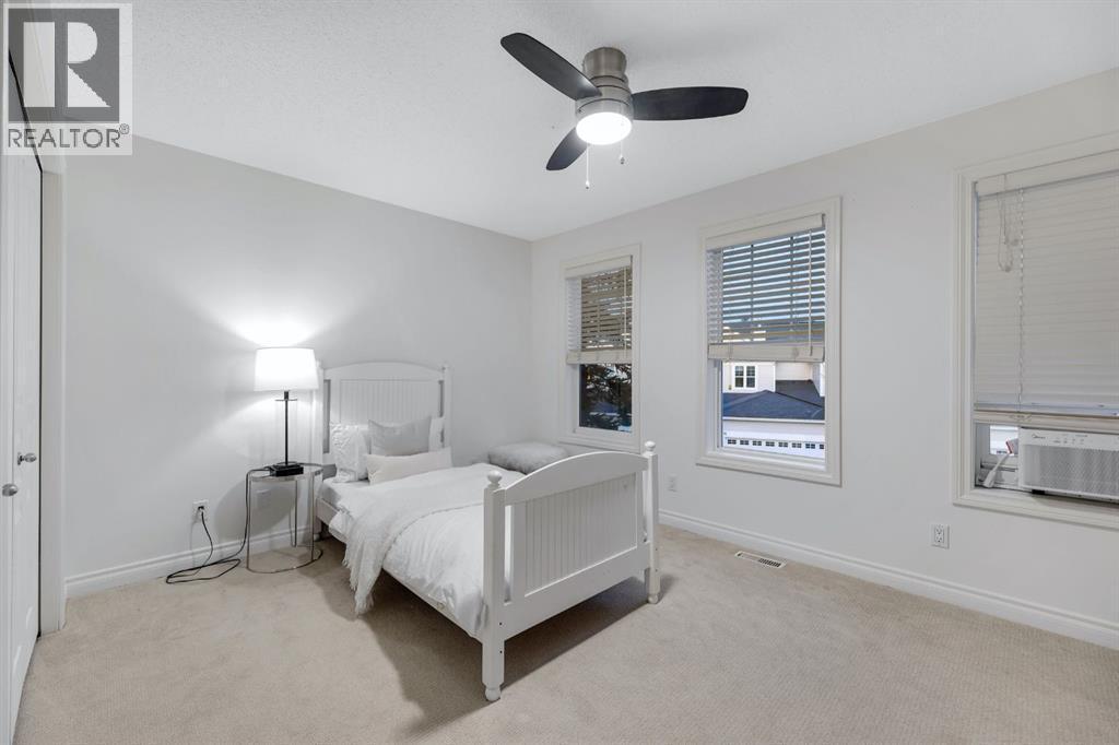 12, 10 St Julien Drive Sw, Calgary, AB - Indoor Photo Showing Bedroom