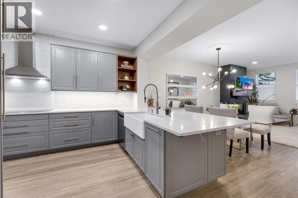 12, 10 St Julien Drive Sw, Calgary, AB - Indoor Photo Showing Kitchen With Upgraded Kitchen