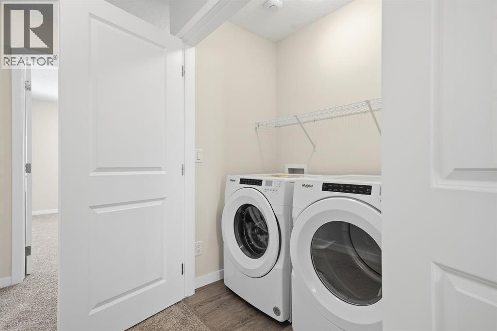 Laundry Room - 292 Cornerbrook Drive Ne, Calgary, AB - Indoor Photo Showing Laundry Room
