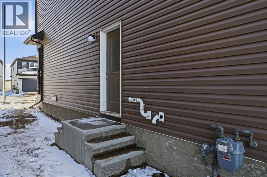 Side Entrance - 292 Cornerbrook Drive Ne, Calgary, AB - Outdoor With Exterior