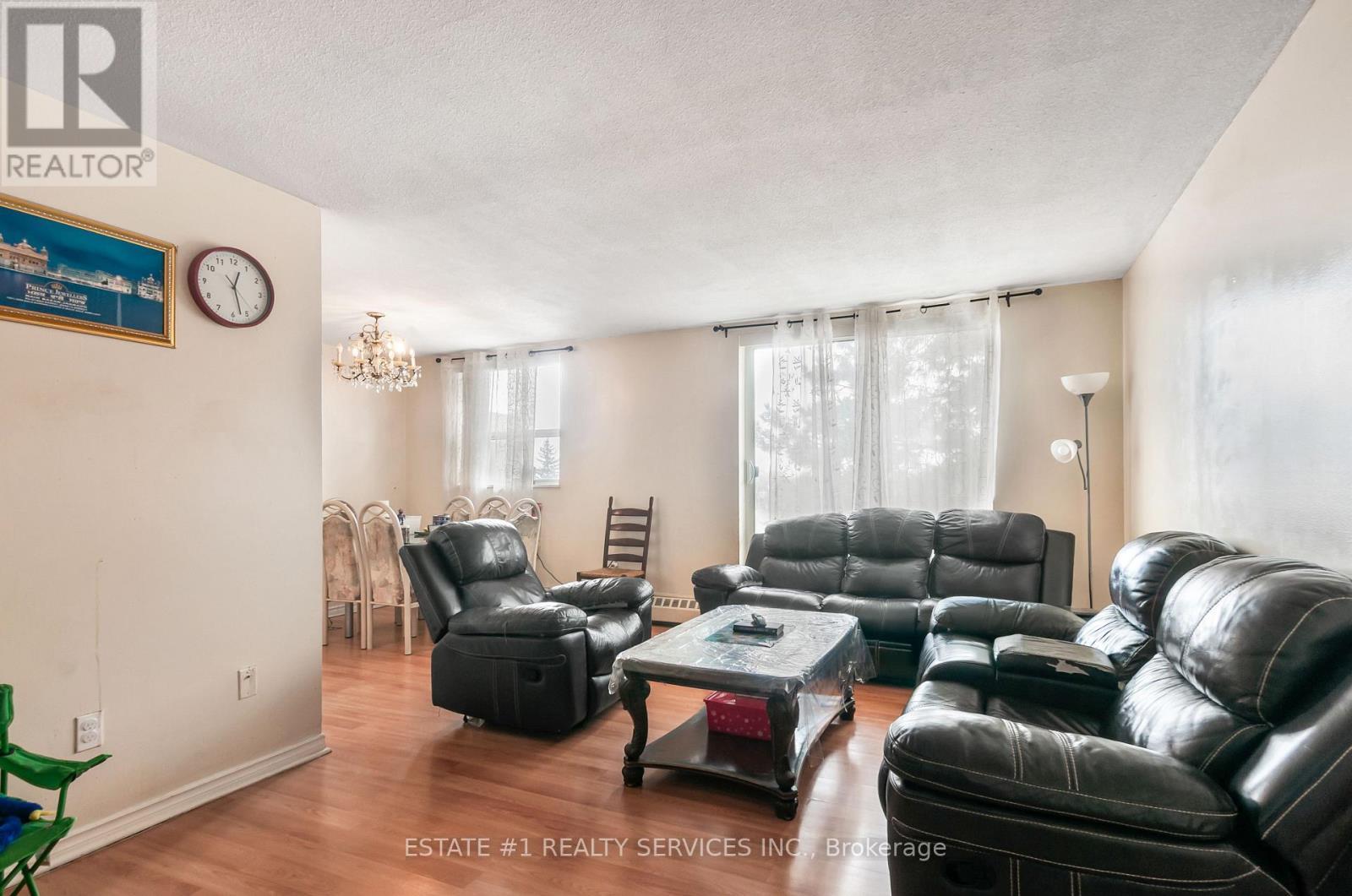 402 - 3555 Derry Road E, Mississauga, ON - Indoor Photo Showing Living Room