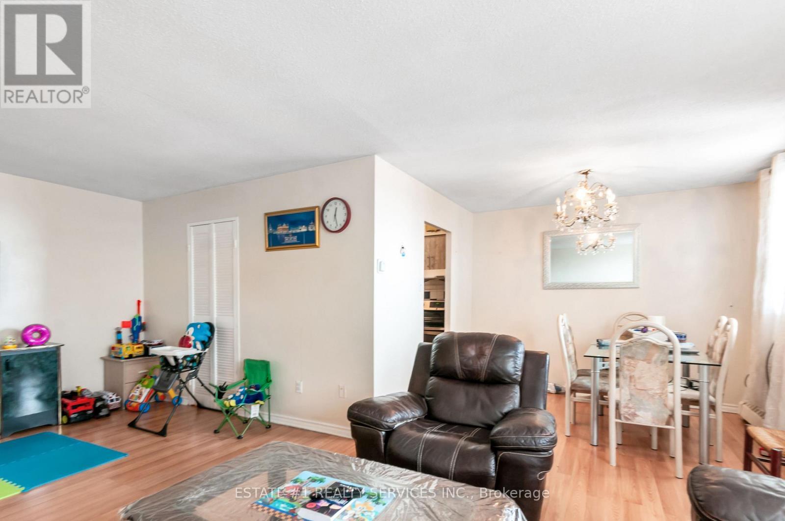 402 - 3555 Derry Road E, Mississauga, ON - Indoor Photo Showing Living Room
