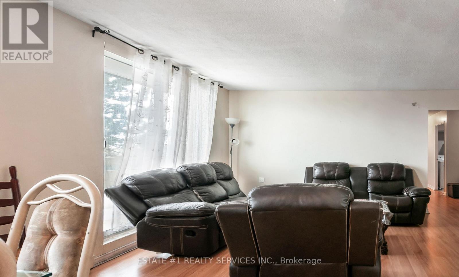402 - 3555 Derry Road E, Mississauga, ON - Indoor Photo Showing Living Room