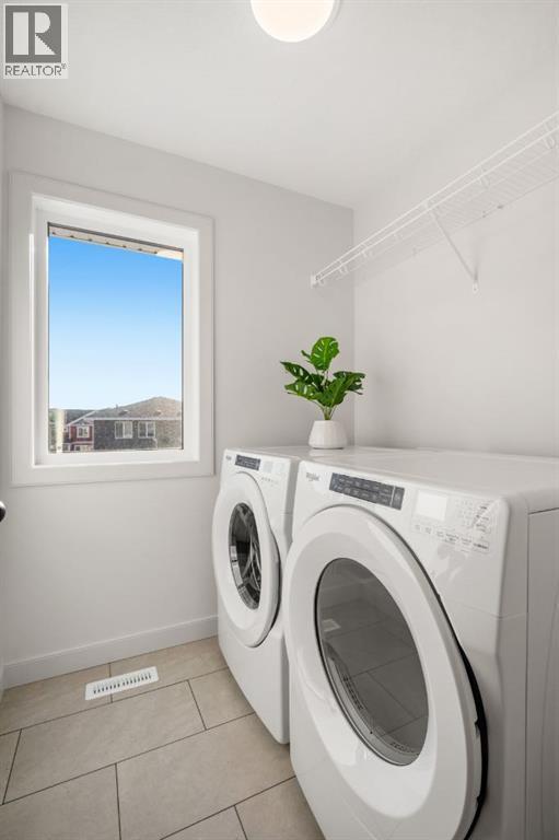 152 Sage Hill Heights Nw, Calgary, AB - Indoor Photo Showing Laundry Room