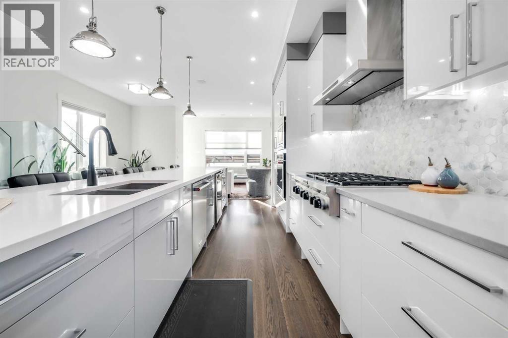 2415 25 Avenue Nw, Calgary, AB - Indoor Photo Showing Kitchen With Double Sink With Upgraded Kitchen