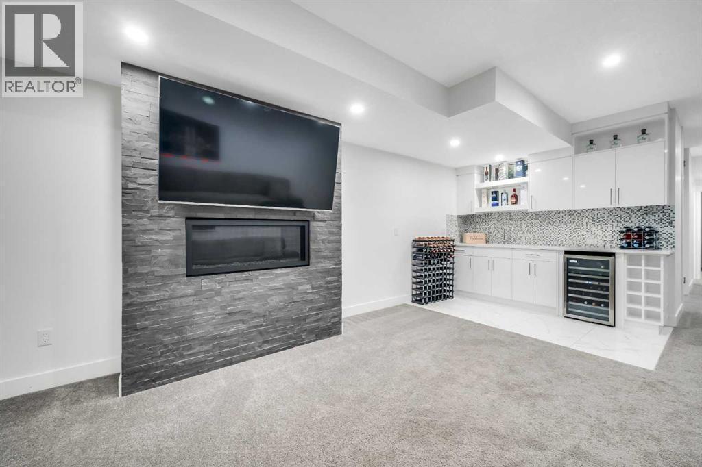 Wet Bar - 2415 25 Avenue Nw, Calgary, AB - Indoor With Fireplace