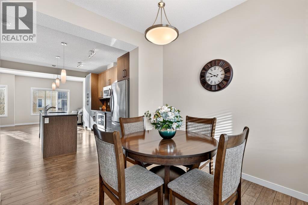 330 Marquis Lane Se, Calgary, AB - Indoor Photo Showing Dining Room