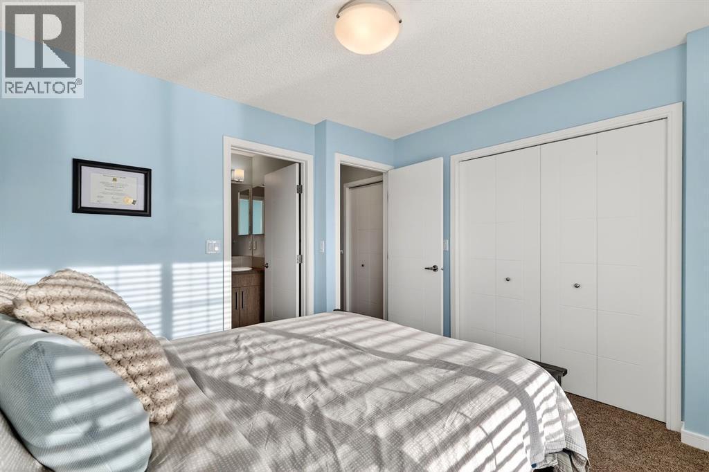 330 Marquis Lane Se, Calgary, AB - Indoor Photo Showing Bedroom
