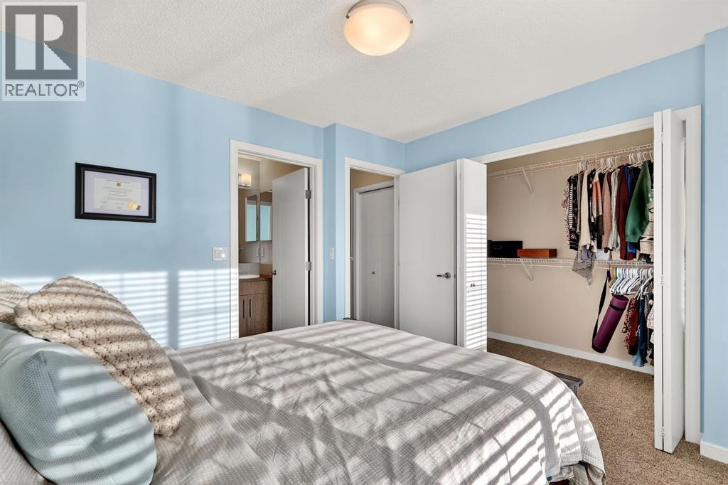 330 Marquis Lane Se, Calgary, AB - Indoor Photo Showing Bedroom