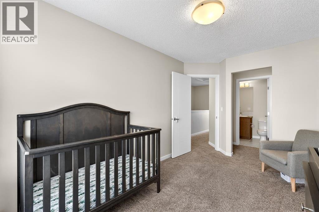 330 Marquis Lane Se, Calgary, AB - Indoor Photo Showing Bedroom