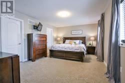 Primary bedroom with his & hers walk in closets! -