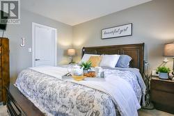 Primary bedroom with his & hers walk in closets! -