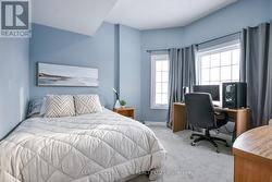 3rd bedroom with bay window and large closet. -