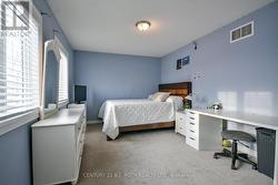 Bright, large 4th bedroom with new carpet. -