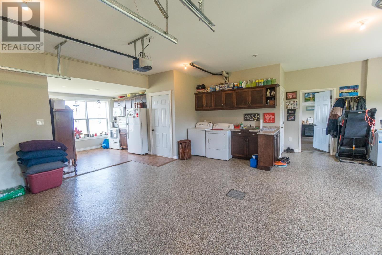 18 Shore Rd E, Hampton, PE - Indoor Photo Showing Garage