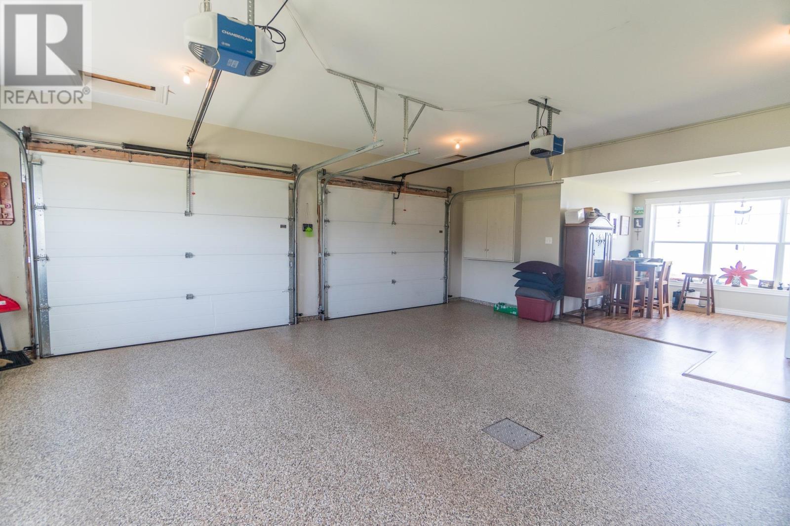 18 Shore Rd E, Hampton, PE - Indoor Photo Showing Garage