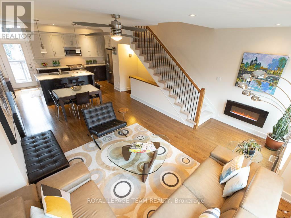112 Greenfield Avenue, Ottawa, ON - Indoor Photo Showing Living Room With Fireplace