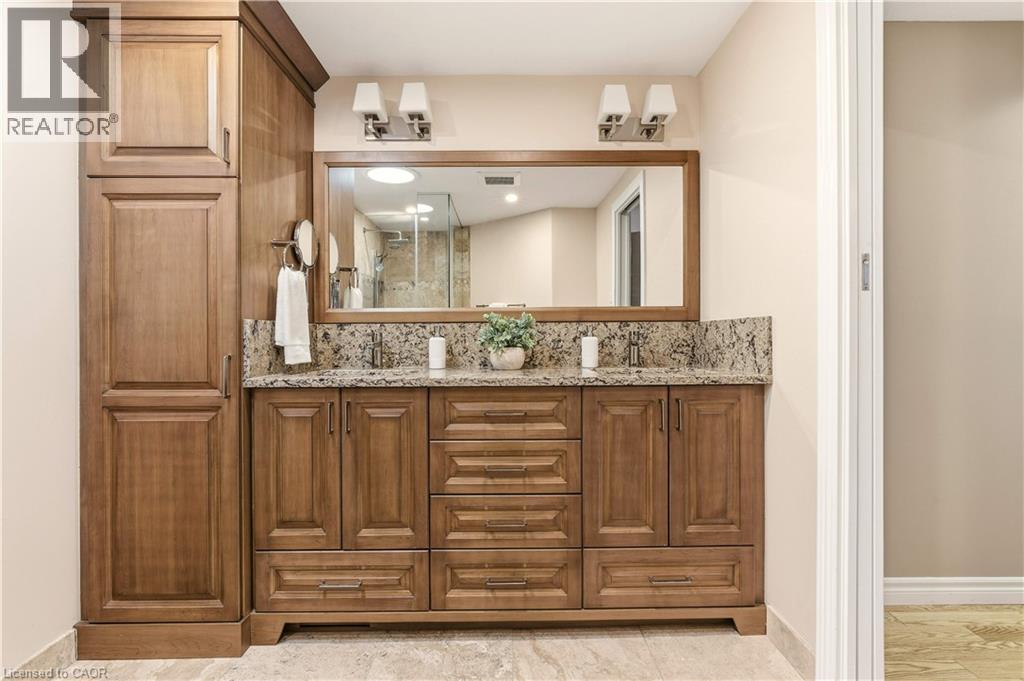Full bathroom featuring double vanity and a stall shower - 1489 Litchfield Road, Oakville, ON - Indoor Photo Showing Bathroom