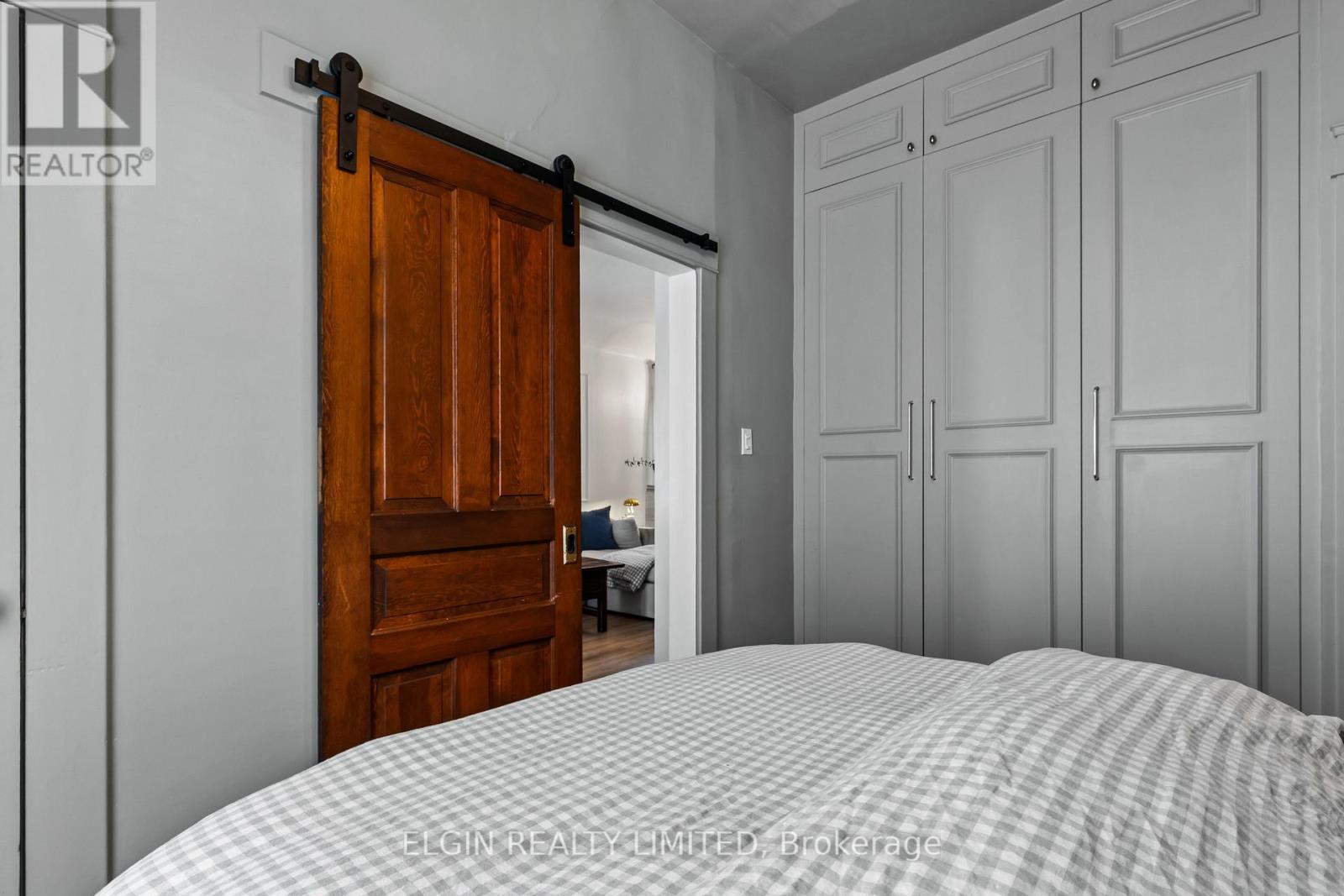 Master Bedroom wall of closets - 84 Pleasant Avenue, St. Catharines (Downtown), ON - Indoor Photo Showing Bedroom