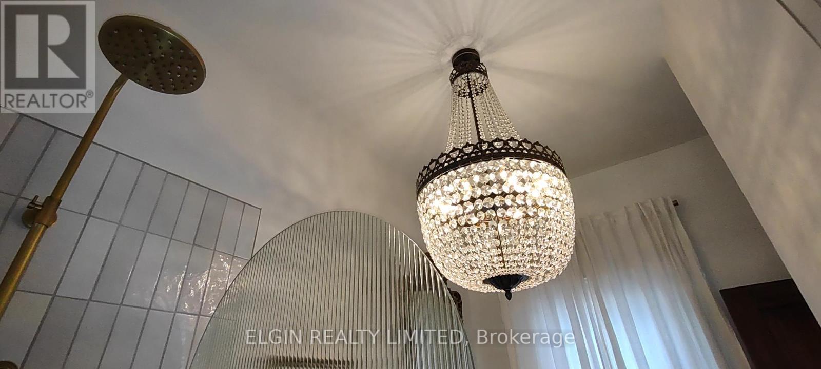 Ensuite shower head and light fixture - 84 Pleasant Avenue, St. Catharines (Downtown), ON - Indoor Photo Showing Other Room