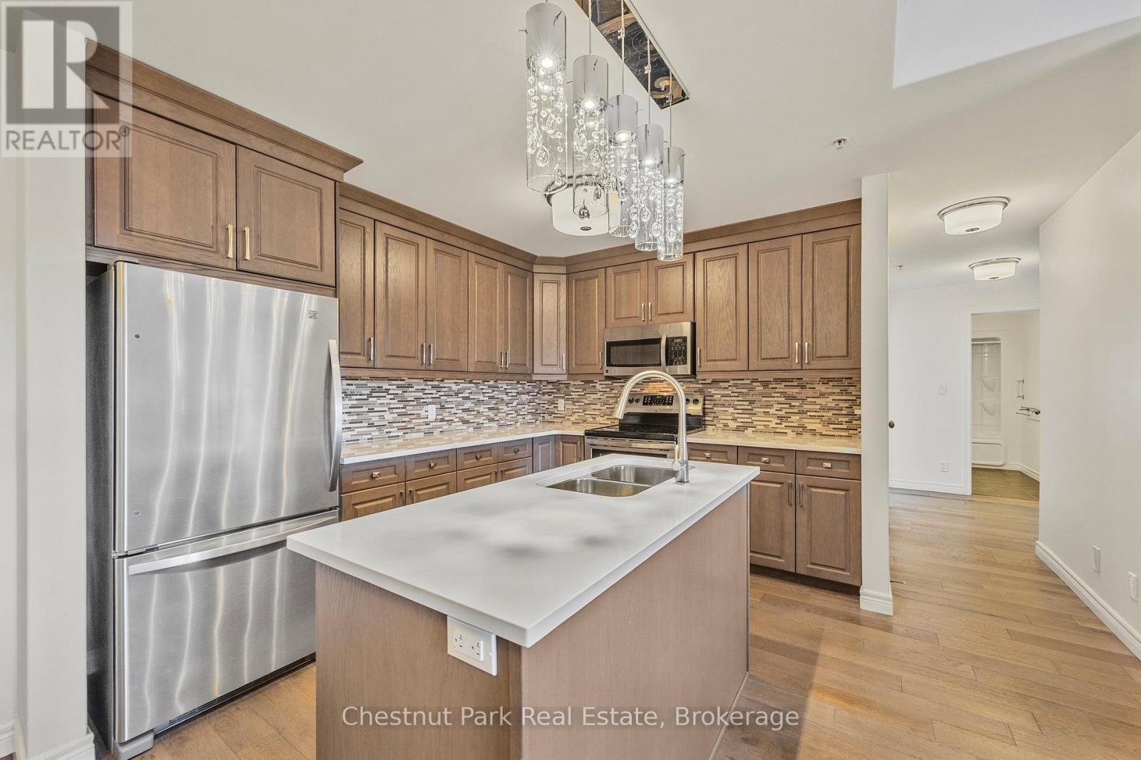 304 - 1 Chamberlain Crescent, Collingwood, ON - Indoor Photo Showing Kitchen With Double Sink