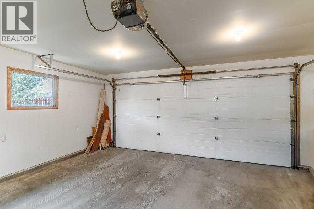 7639 Ogden Road Se, Calgary, AB - Indoor Photo Showing Garage