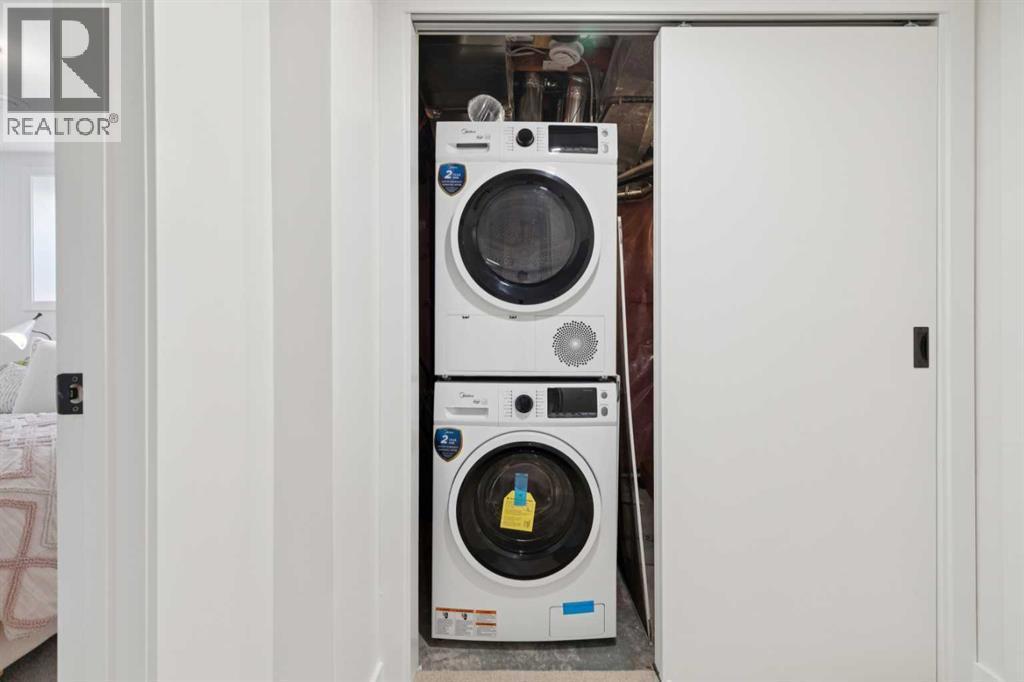 4547 Passchendaele Road Sw, Calgary, AB - Indoor Photo Showing Laundry Room